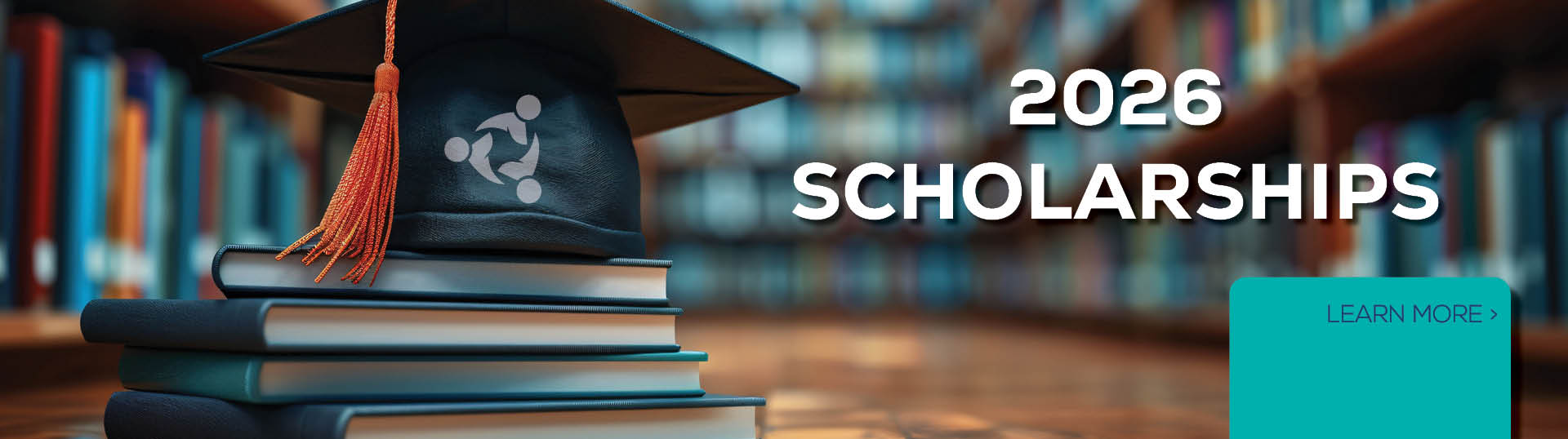 Apply for 2026 scholarships – graduation cap on books in a library setting