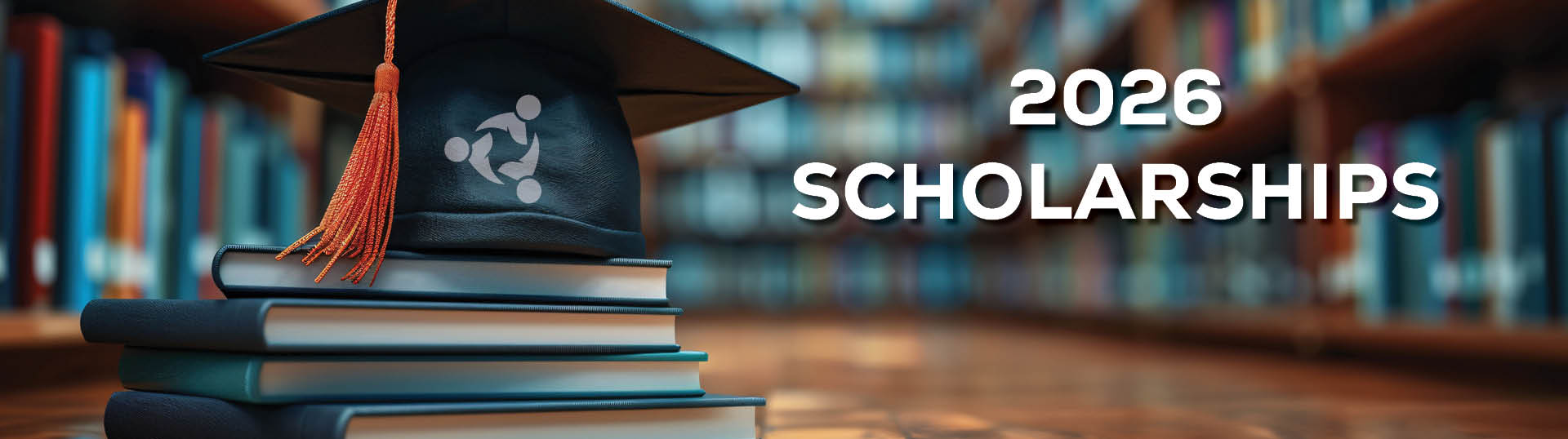 Graduation cap on stacked books in a library with text promoting 2026 scholarships and a learn more button